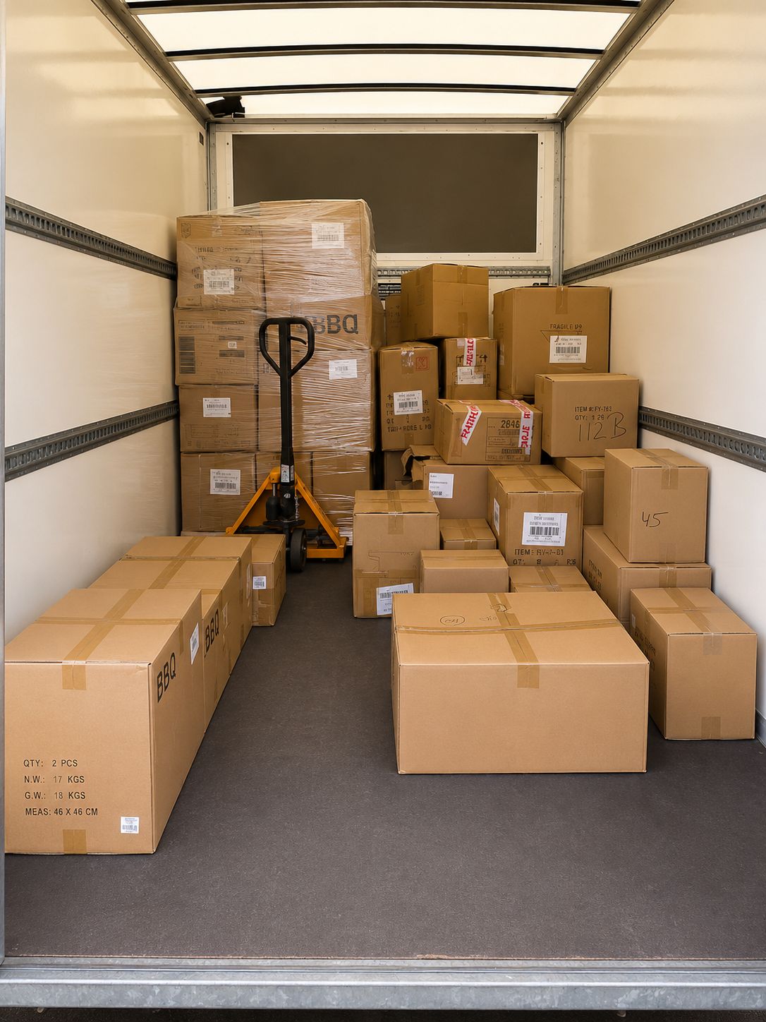 DropShift Transport crew packing and moving furniture in a kitchen